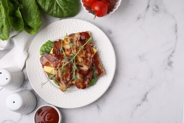 Tasty sandwich with bacon and microgreens served on white marble table, flat lay. Space for text