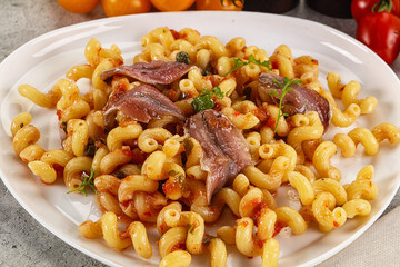 Italian pasta cellentani with anchovy