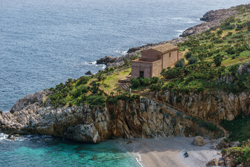 Famous natural reserve Riserva Naturale Orientata dello Zingaro with beach Cala dell'Uzzo and turquoise sea water, San Vito Lo Capo, Sicily, Italy