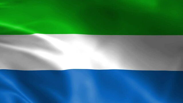 Sierra Leone flag in the wind. Detailed fabric texture.