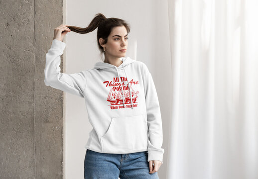 Mockup of woman wearing customizable hoodie with pony tail
