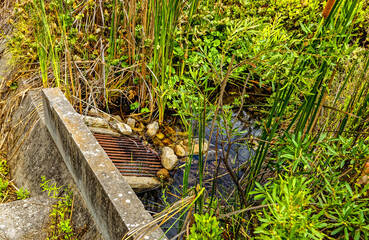 Small weir used to collect clean mountain water from a stream for supplying water to small village in Little Karoo, Western Cape, South Africa