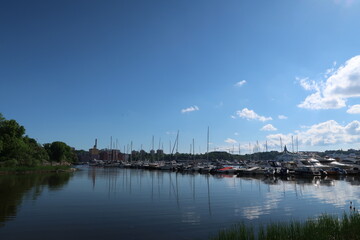 Boats in the water at Stockholm djurgården with the city in the background