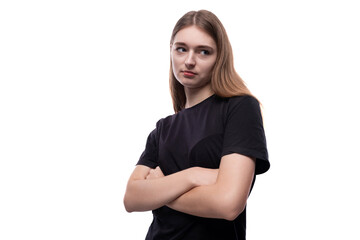 Obraz premium European schoolgirl girl with brown hair looks arrogantly to the side