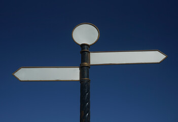 2 two Blank right directional arrows signpost isolated on  blue sky background. white mock up...