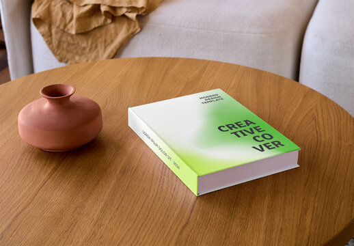 Mockup of customizable hardback book on table