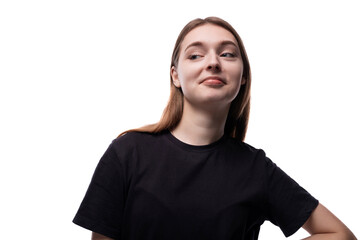 A 15 year old girl with brown hair is wearing a black basic T-shirt