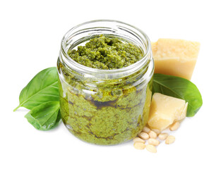 Fresh tasty pesto sauce, basil and cheese isolated on white