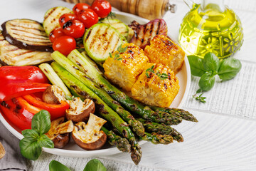 Assorted grilled vegetables on a plate, showcasing a colorful meal