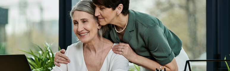 Two women lovingly embracing in warm hug.