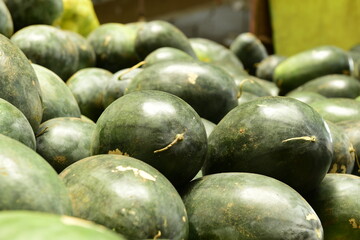 Watermelons at a fruit stall at market