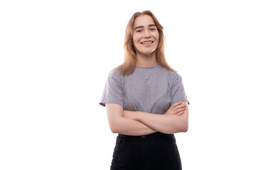 European teenager girl with blond hair and braces on a white background with copy space