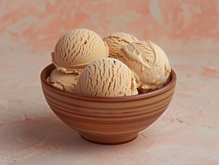 Scoops of brown sugar ice cream in a rustic bowl