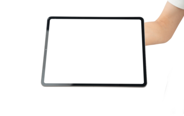 A person is holding a tablet with a black screen
