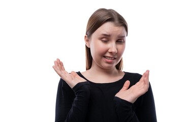 Portrait of a European schoolgirl with a puzzled look on her face