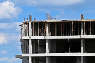 Building construction site work and sky