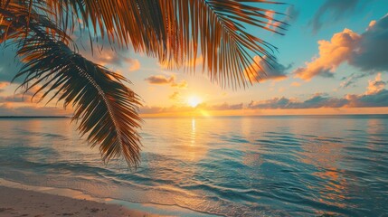 Panoramic sunset view of the beautiful coast, with turquoise sea next to fine sandy beaches and palm trees