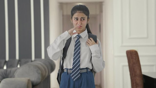 Indian school girl disgusted by bad smell