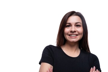 Young friendly woman with black hair wearing a black T-shirt on a white background with copy space