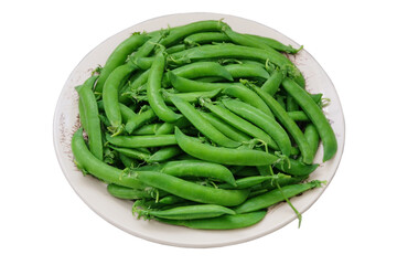 Green peas in a plate isolated on white background. Fresh peas in bowl. Bowls of vegetables.