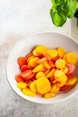 carrot slice colorful vegetable carrots rings salad fresh cooking appetizer meal food snack on the table copy space food background rustic top view