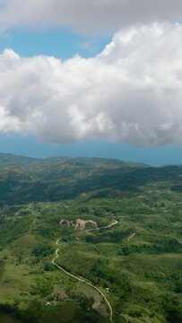 Aerial view of countryside with agricultural land in the mountains. Libo hills. Cebu island, Philippines.