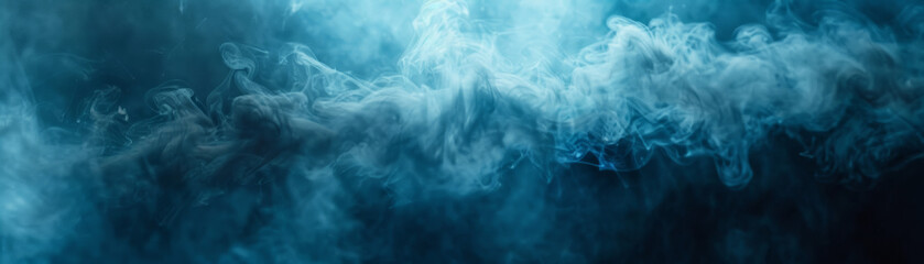 Obraz premium Mystical swirling blue smoke creates an ethereal feel, adding a dramatic touch of mystery and ambience perfect for backgrounds and creative designs.