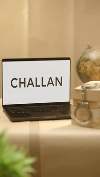 VERTICAL VIDEO OF CHALLAN DISPLAYED IN LEGAL LAPTOP SCREEN