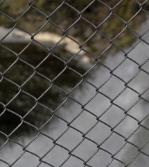 Fence pattern and texture with waterfall background