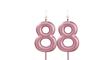 Candle number 88 - Lit birthday candle on white background