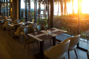 Beautiful restaurant hall, modern interior design of catering industry.