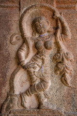 Stone bas-reliefs on the walls around the Temple in Hampi.  Unesco World Heritage Site. The famous tourist destination. Karnataka, India.