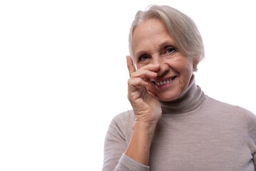 Portrait of a charming senior woman with gray hair