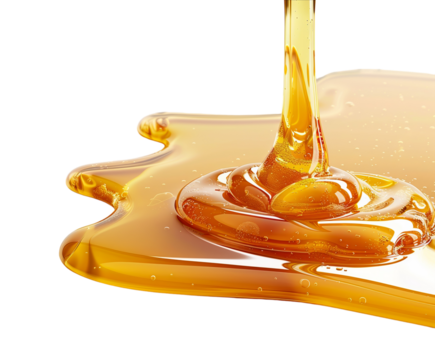 Golden honey dripping isolated on white