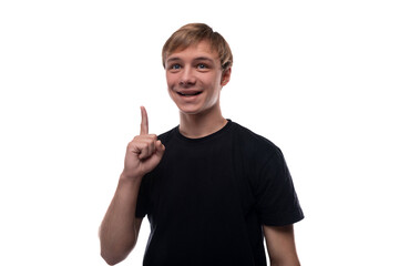 Active Caucasian fair-haired teenager guy reports interesting news