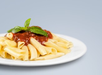 Spicy tasty pasta noodles in a plate