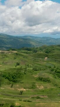 Agricultural land among hills and mountains in a mountainous province. Libo hills. Cebu island, Philippines.