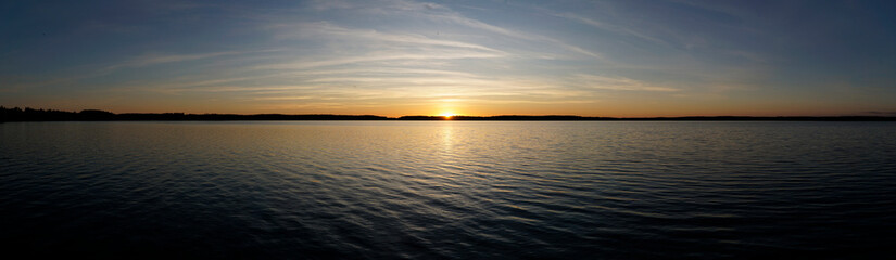 Sunset over lake - panorama