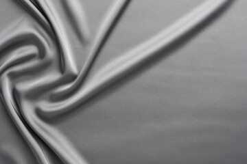 Texture of beautiful light grey silk fabric as background, closeup