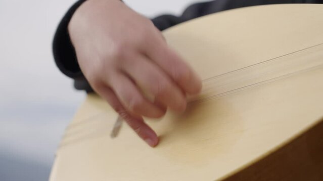 traditional Turkish instrument baglama playing
