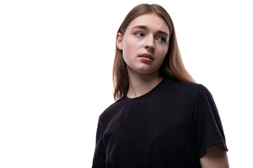 Portrait of a serious teenage girl in a black T-shirt