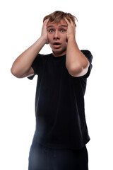 Teen boy dressed in a black t-shirt is excited and puzzled