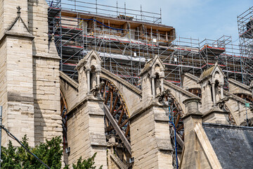 Horizontal image of the right side of the Notre Dame cathedral in Paris, on a sunny day in the...