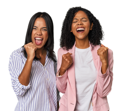 Young Latin businesswomen in studio cheering carefree and excited. Victory concept.
