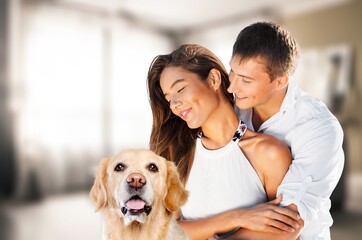 Authentic portrait happy young couple with dog