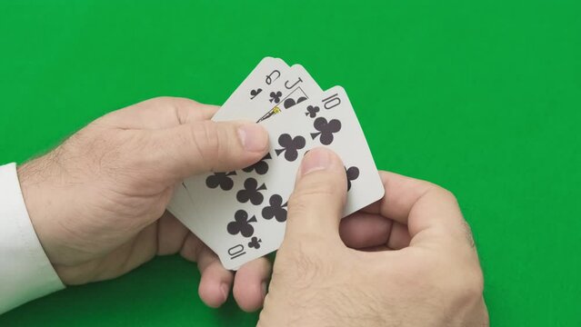 card combinations in poker royal flush of clubs from ace to ten, slow motion
