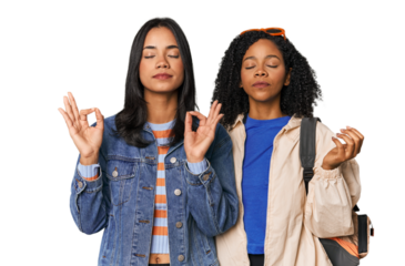 Latin friends ready for vacation relaxes after hard working day, she is performing yoga.