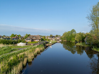 Obraz premium Aerial View: Village Burdaard in Friesland, Netherlands with houses 