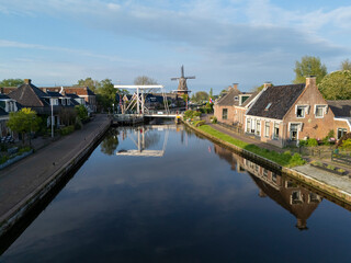 Aerial View: Village Burdaard in Friesland, Netherlands with houses  