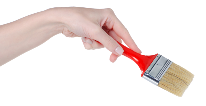 Red paint brushes in hand on white background isolation